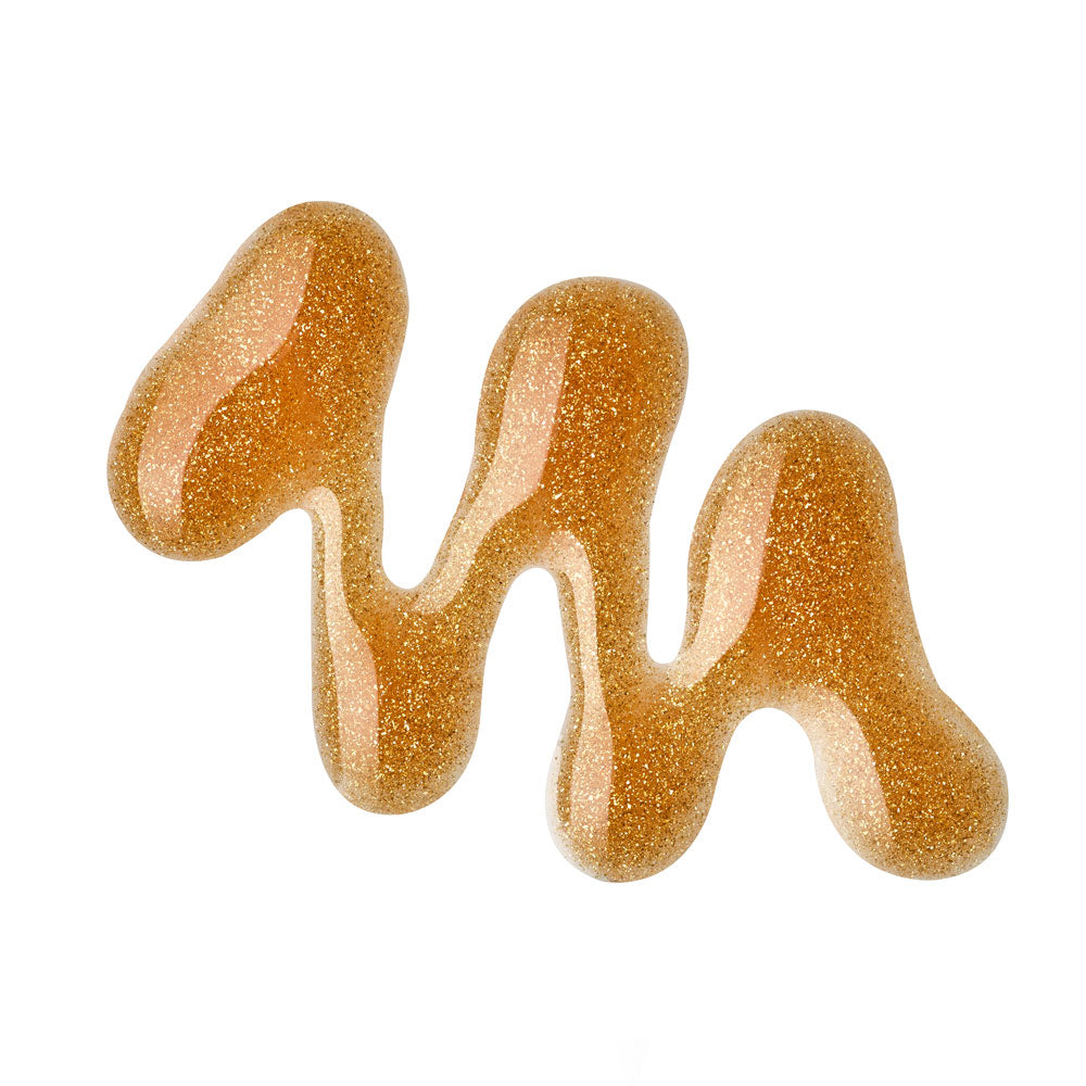 Monoi moisturizing oil with gold particles